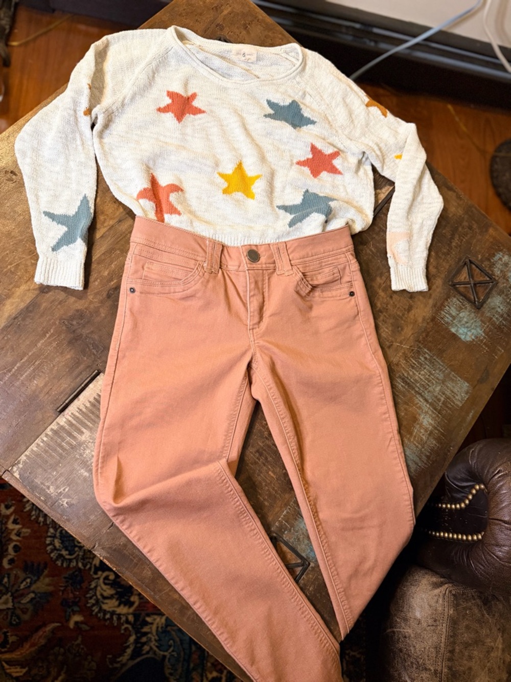 Women’s  Sweater with Stars paired with Peach Pink Mid-Rise Jeans